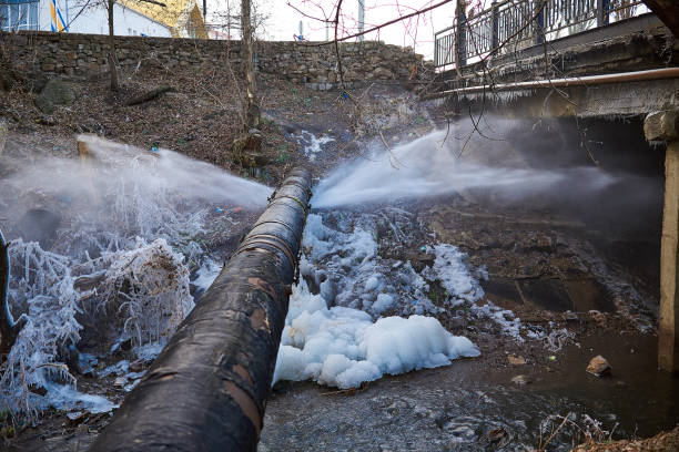 water pressure from a large pipe over the river